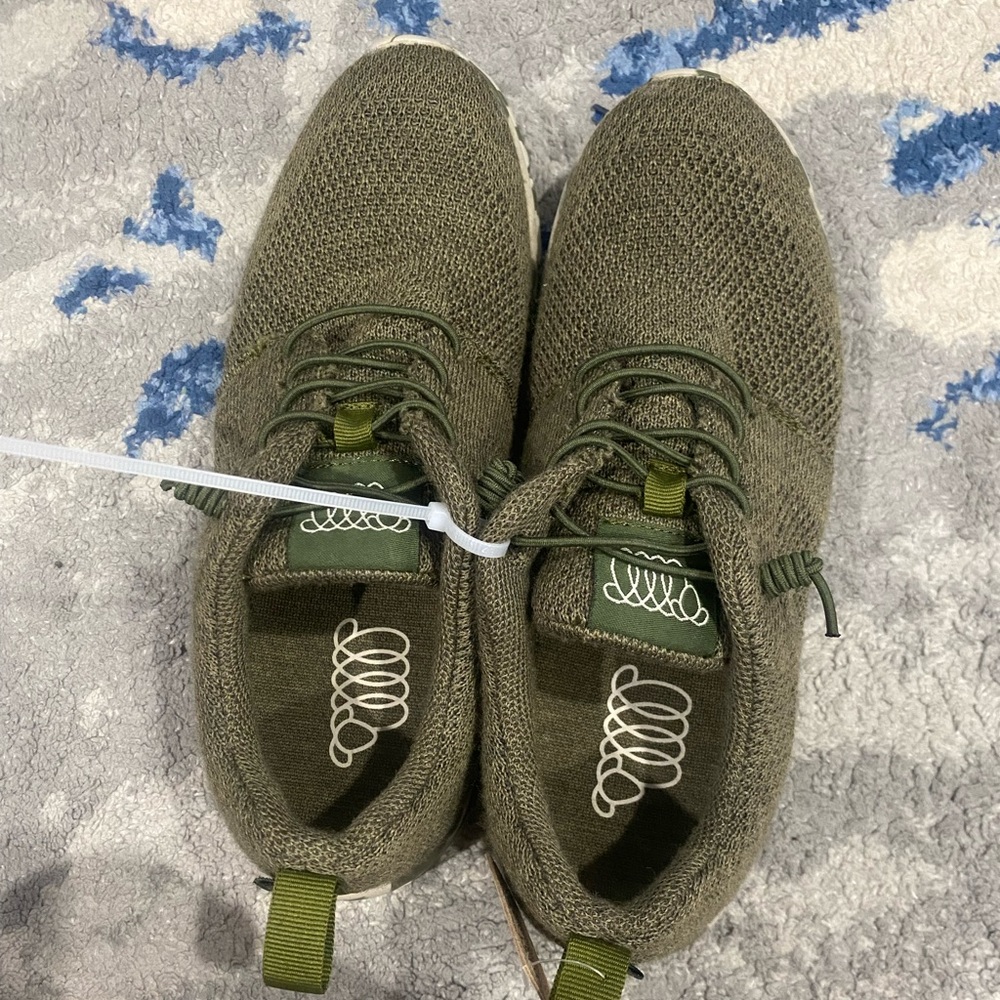 Brand new with tags sneakers.  The color is an army green color.